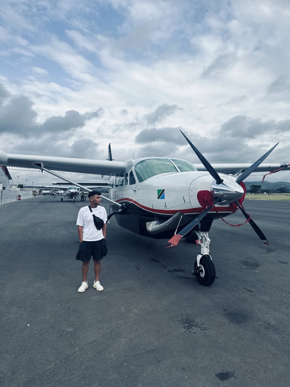 Abdo Salman standing near an airplane